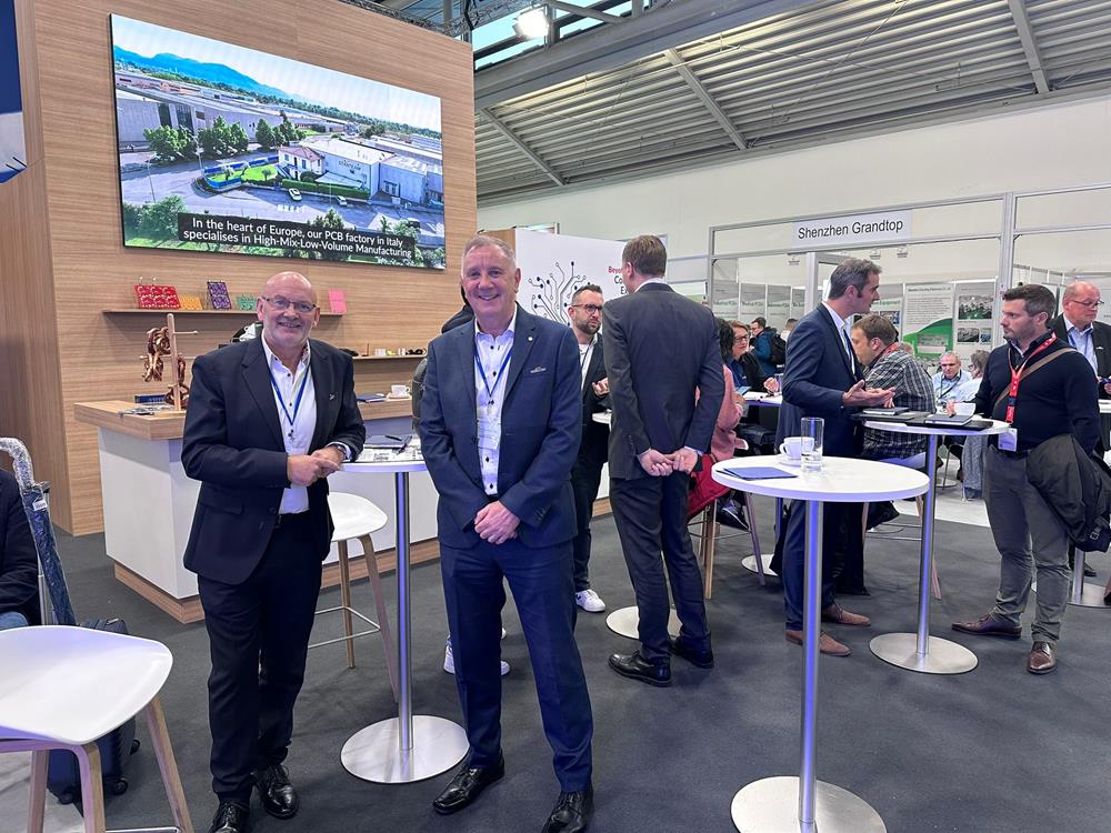 Michael Fray and Alan Millard posing for the camera at the Starteam stand at Electronica 2024
